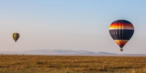 two hot air balloons over mara